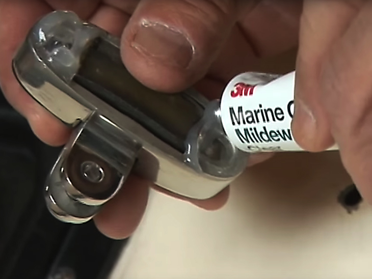 Using Marine Silicone on deck hardware.